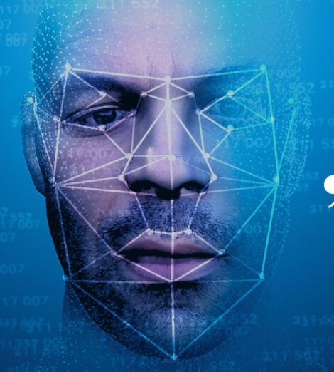A man's face with a speech bubble, highlighting Biometrics Institute members' call for a consistent approach to facial recognition.