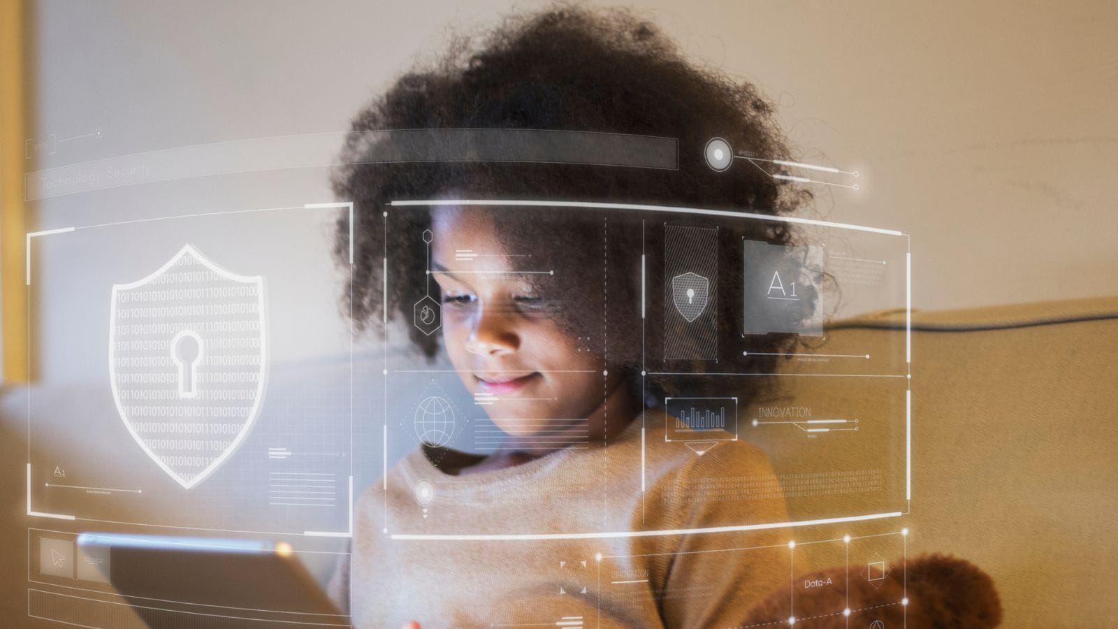 A young person using a tablet with virtual shield graphics