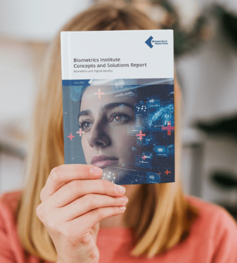 Woman holding Biometrics Institute Digital Identity document